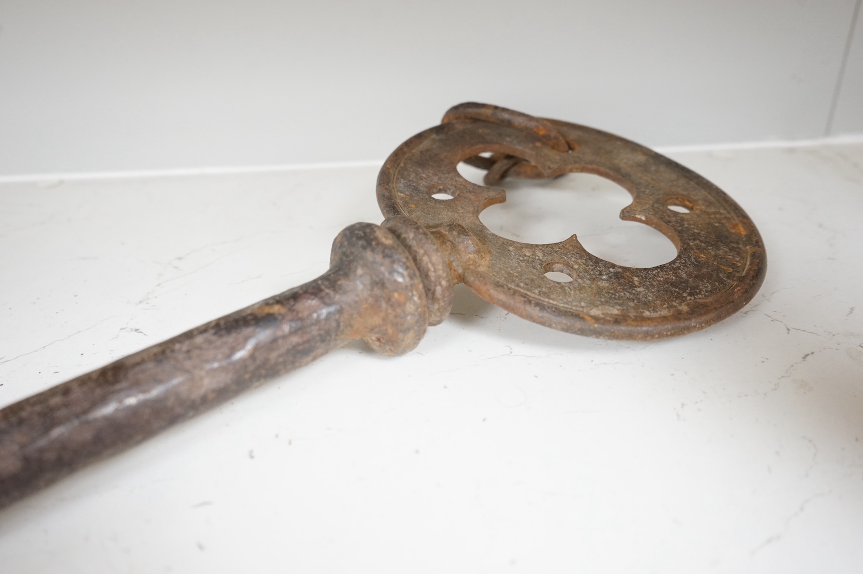 An oversized cast iron shop sign advertising key, 50cm wide. Condition - fair